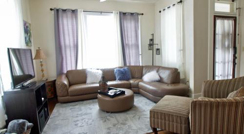 The living room faces the piano lounge and is large enough for your group