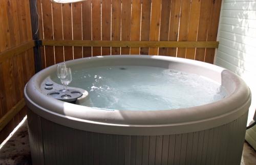 The brand-new hot tub is large and very comfortable for two.